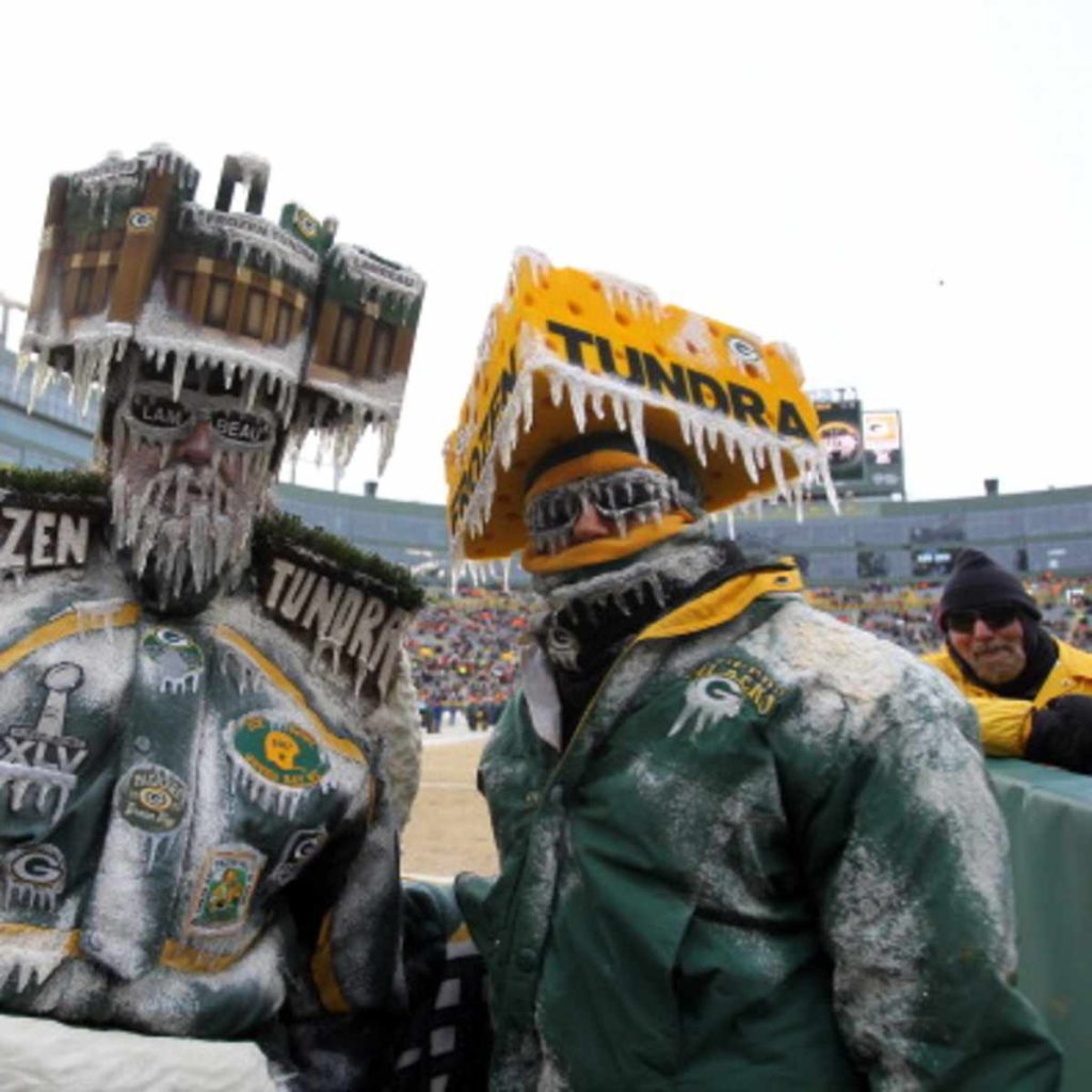 Lambeau Field in Green Bay during cold winter weather with snow and cloudy skies